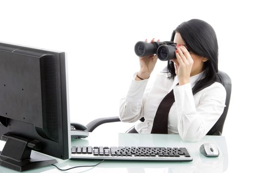 young ceo looking through binocular with white background