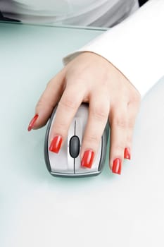 close up of finger on mouse with white background