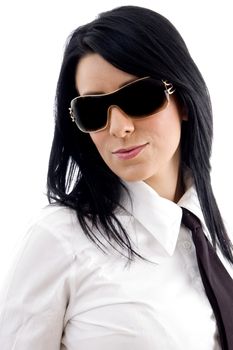 young businesswoman wearing sunglasses on an isolated background