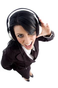 young employee holding headphone on an isolated background