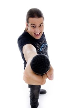 young singer holding microphone on an isolated background