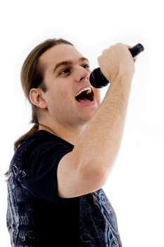 young male singing into microphone on an isolated white background