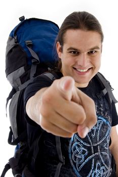 pointing traveler with bag on an isolated white background