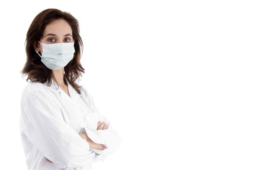 pose of doctor with facemask on an isolated white background