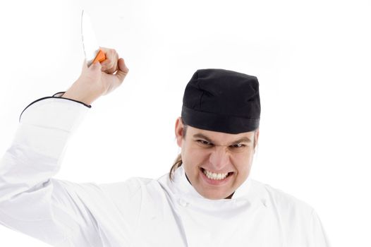 male chef attacking with knife with white background