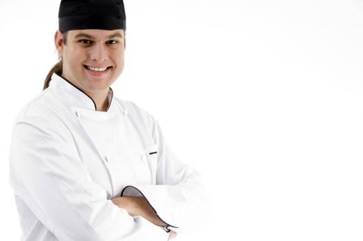 smiling young male chef on an isolated white background