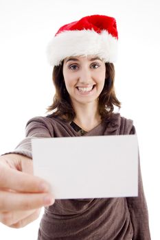 woman wearing christmas hat holding business card on an isolated white background