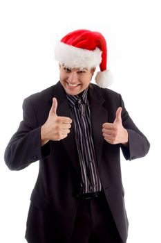 young man wearing christmas hat with hand gesture on an isolated white background