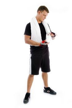 muscular male looking at the medicine bottle on an isolated background