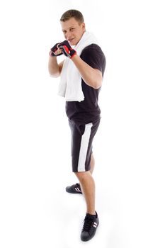 standing adult man showing fists on an isolated background