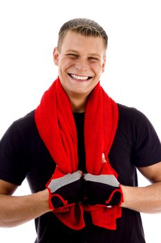 portrait of smiling male with towel looking at camera with white background