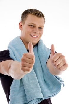 handsome man showing thumbs up on an isolated background