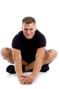 stretching muscular male on an isolated background