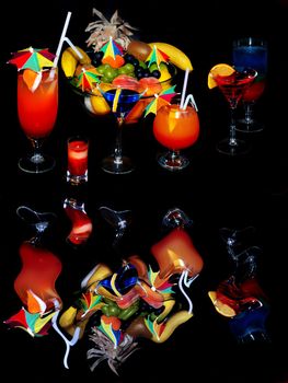 various glass drinks with reflection isolated over black