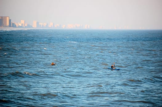 Two Kayakers on the Coast