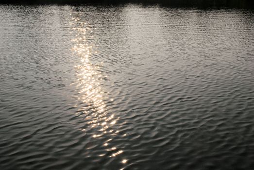 Sun reflecting on a lake