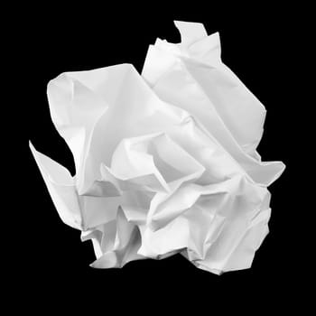 Crumpled sheet of paper on the black background