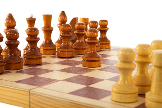 Chess wooden board with figure on the white background