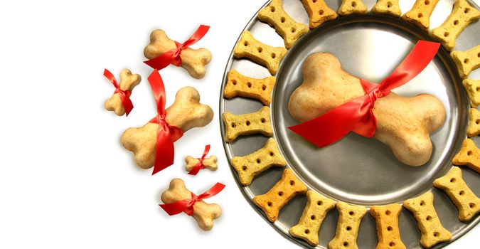 Doggy biscuits for christmas against white background