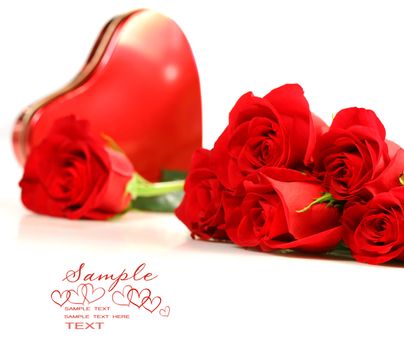 Red roses with boxof chocolate on white background