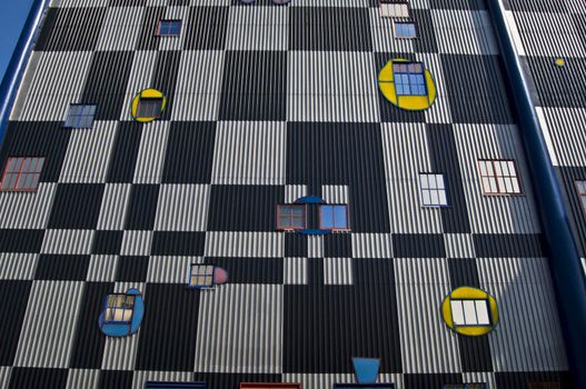 detail of the colorful community heating plant designed by Hundertwasser in Vienna
