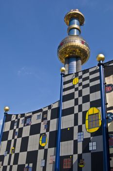 detail of the colorful community heating plant designed by Hundertwasser in Vienna