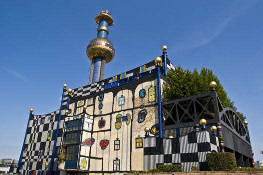 detail of the colorful community heating plant designed by Hundertwasser in Vienna