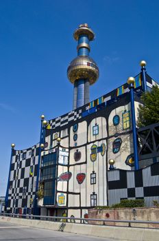 detail of the colorful community heating plant designed by Hundertwasser in Vienna