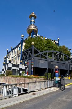 detail of the colorful community heating plant designed by Hundertwasser in Vienna
