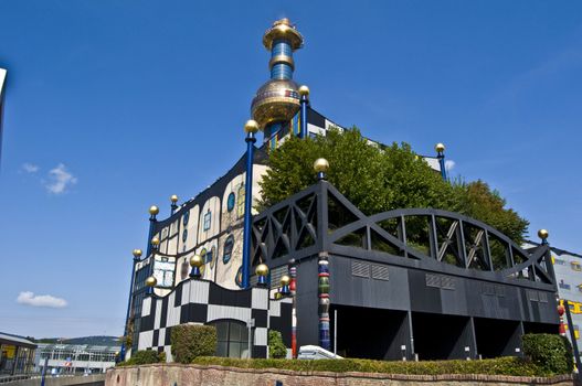 detail of the colorful community heating plant designed by Hundertwasser in Vienna