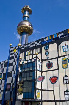 detail of the colorful community heating plant designed by Hundertwasser in Vienna