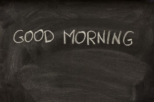 good morning handritten with white chalk on a school blackboard