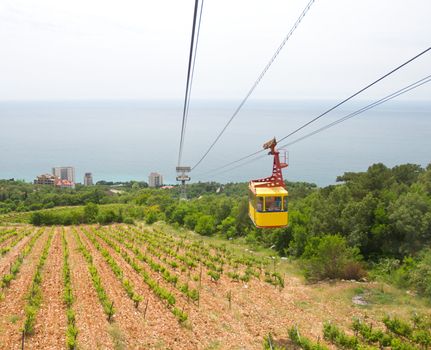 rope-way with tram from mountain to sea