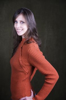 Pretty Young Woman Wearing an Orange Sweater