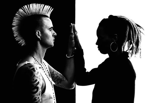 Caucasian Man with Mohawk and African-American Woman with Dreadlocks