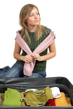 girl is packing clothes, separate on white