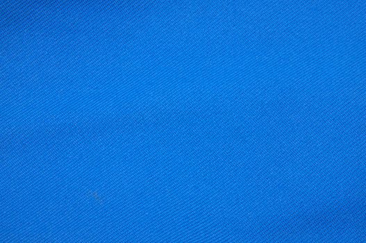 blue fabric of a work suit with texture