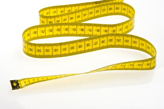 yellow measuring tape isolated on white background