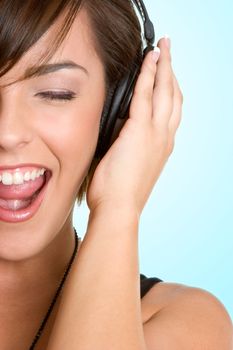 Singing girl wearing headphones