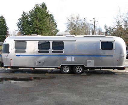 old silver and blue caravan