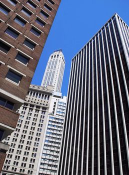 Modern office buildings in New York over blue sky