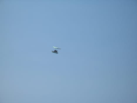 glider in the blue sky