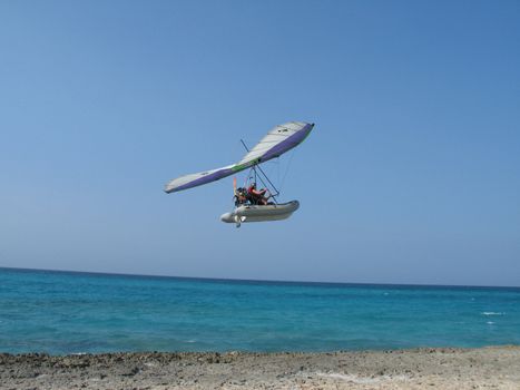 glider in the blue sky