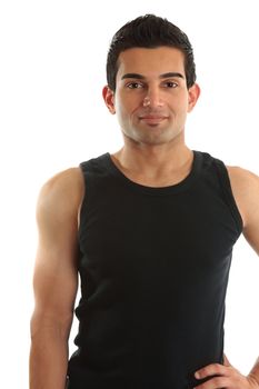 A smiling tradesman, labourer, trainer or fitness instructor wearing a black tank top.  White background,