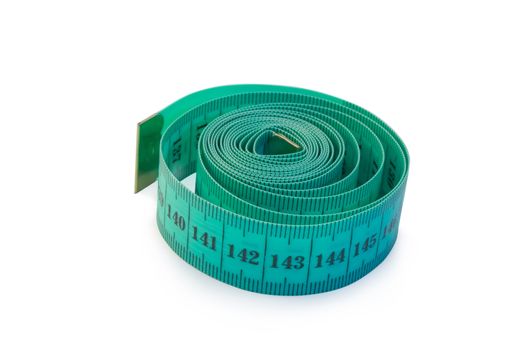 The curtailed green tape measure on a white background