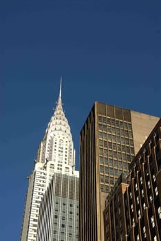 looking up at mid-town nyc buildings