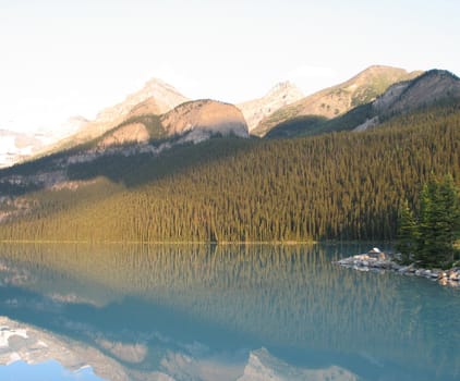 mountain reflection in lake water