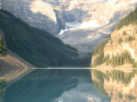 mountain reflection in lake water