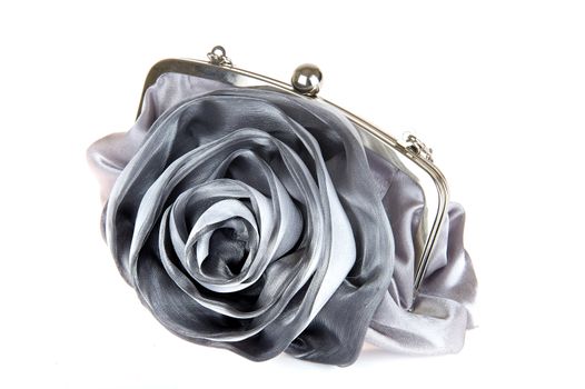 a silver handbag on a white background
