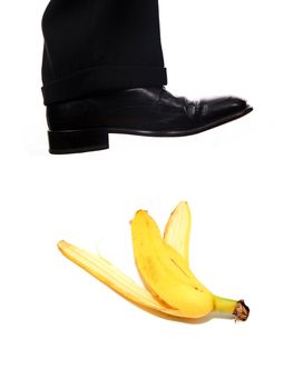 businessman shoe steping a banana